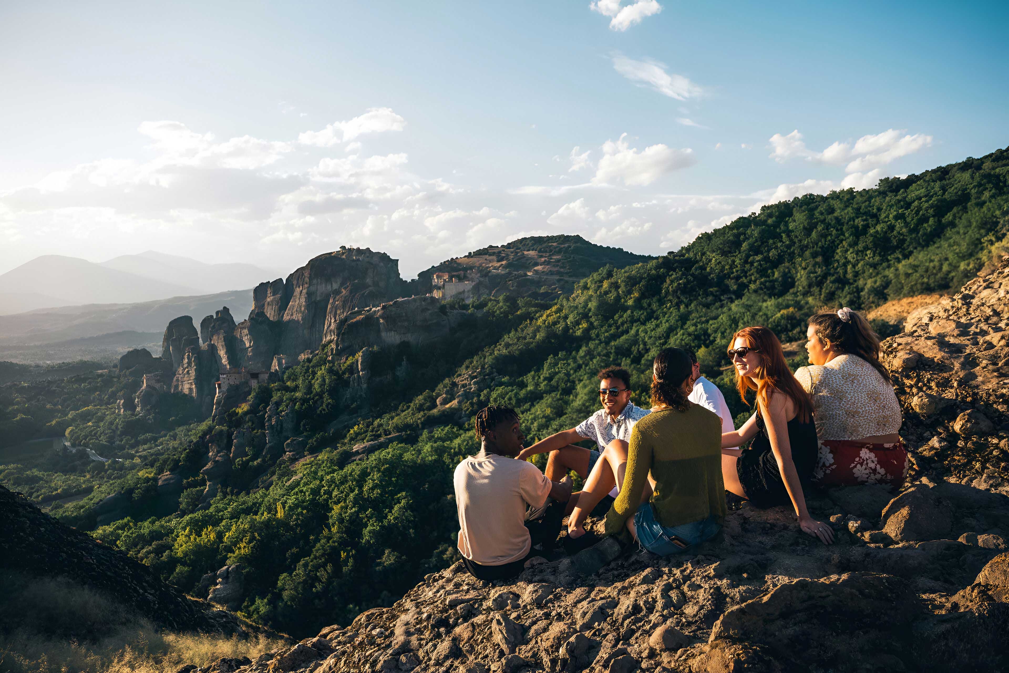 Group Of Friends Enjoying Mountain Landscape