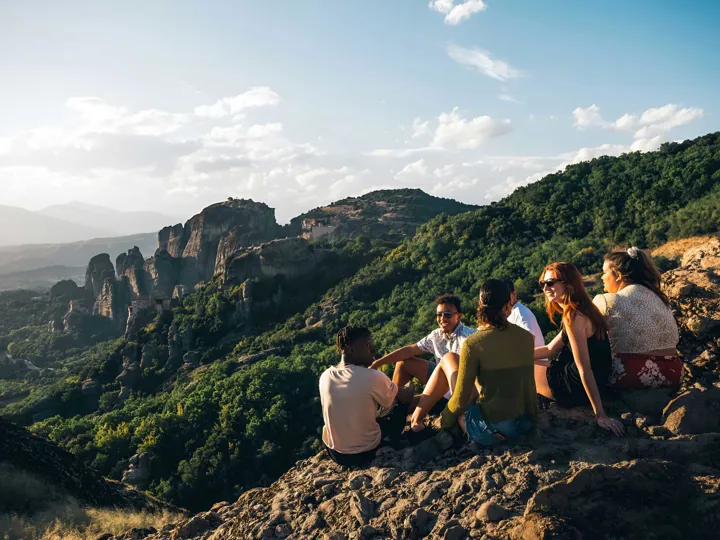 Group Of Friends Enjoying Mountain Landscape