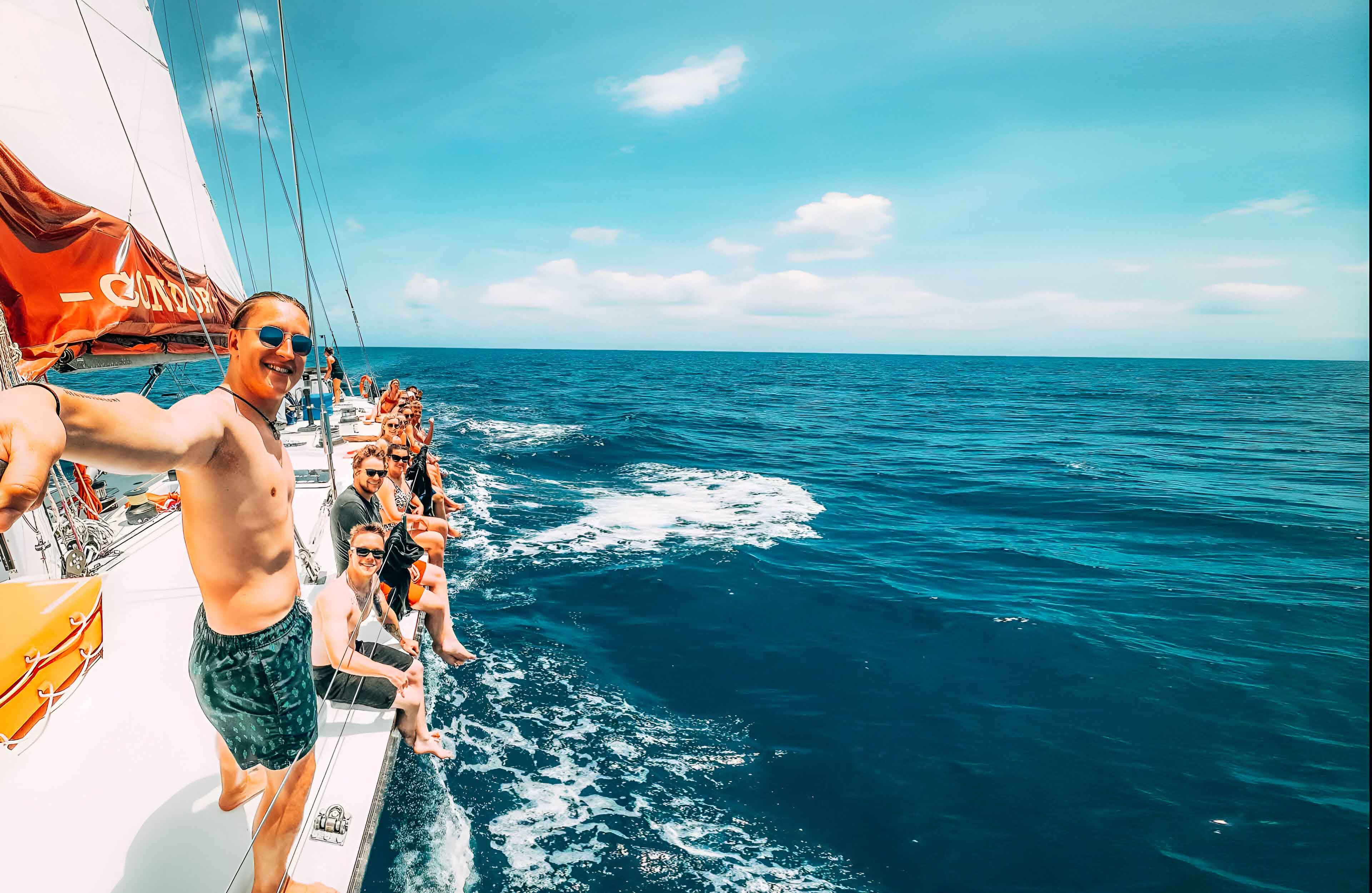 Group Of Young People Sailing Clear Sky Lue Sea