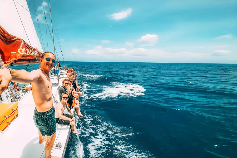 Group Of Young People Sailing Clear Sky Lue Sea