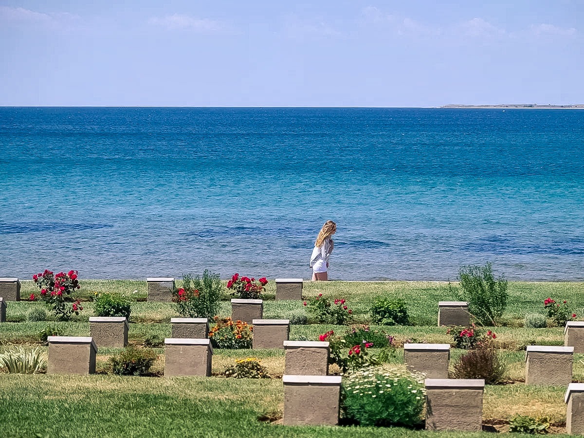 Woman Walking Blue Sea As Background in Turkey.