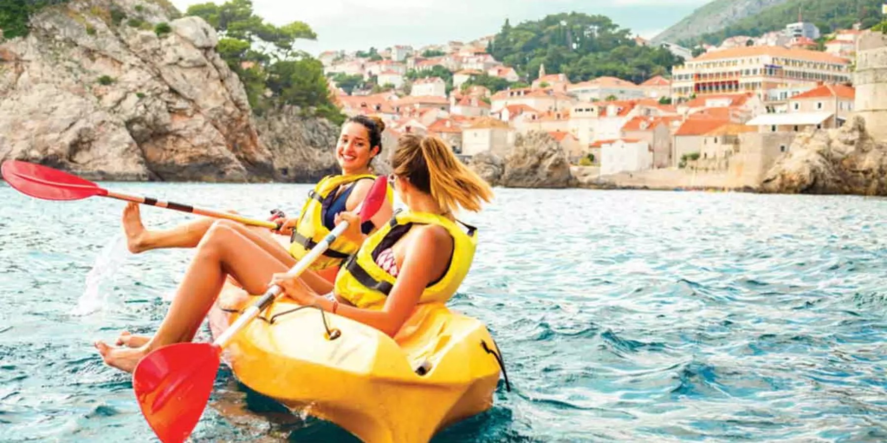 two-young-travelers-kayaking-dubrovnik-croatia.jpg
