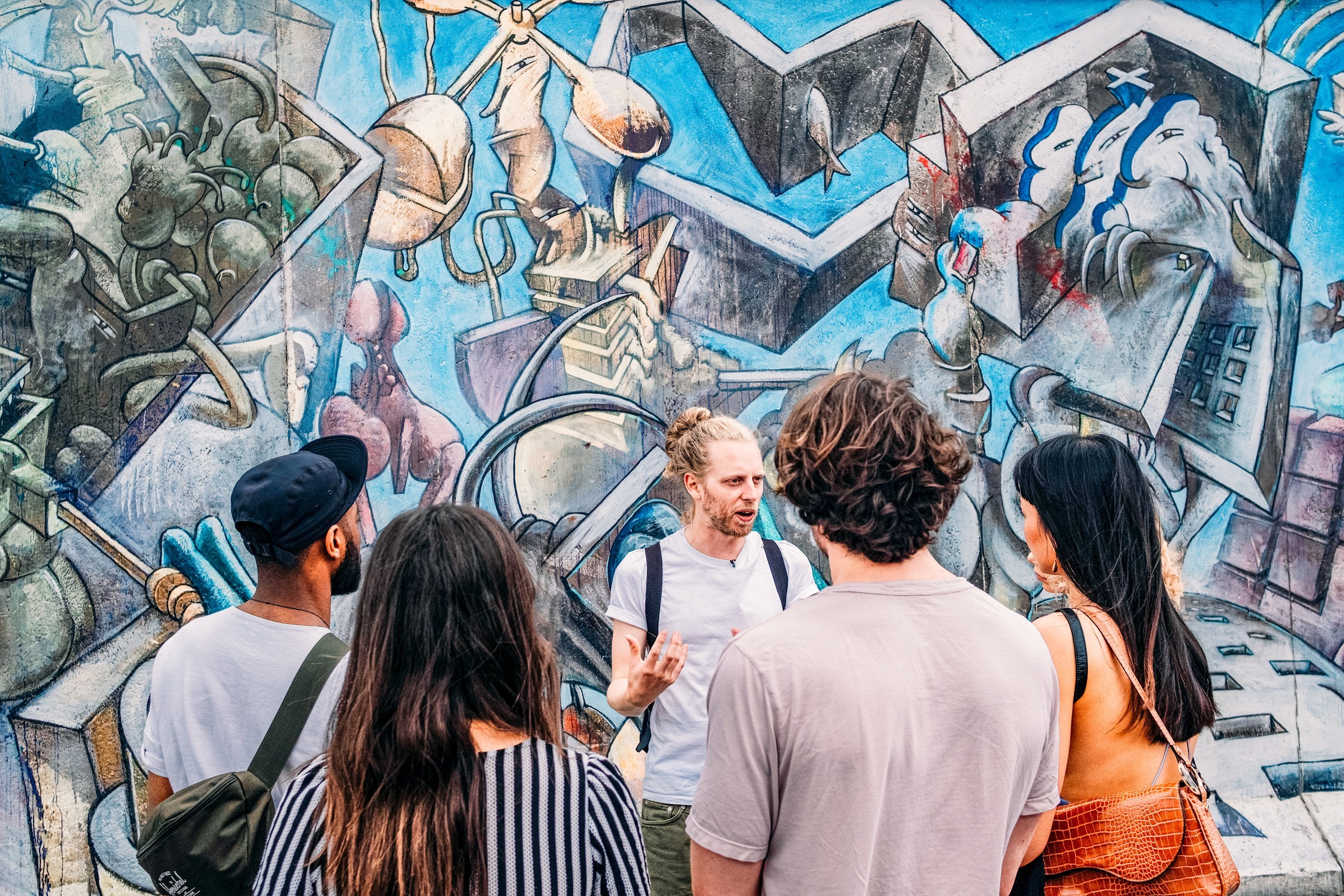 Travellers on a Street Art walking tour in Berlin, Germany