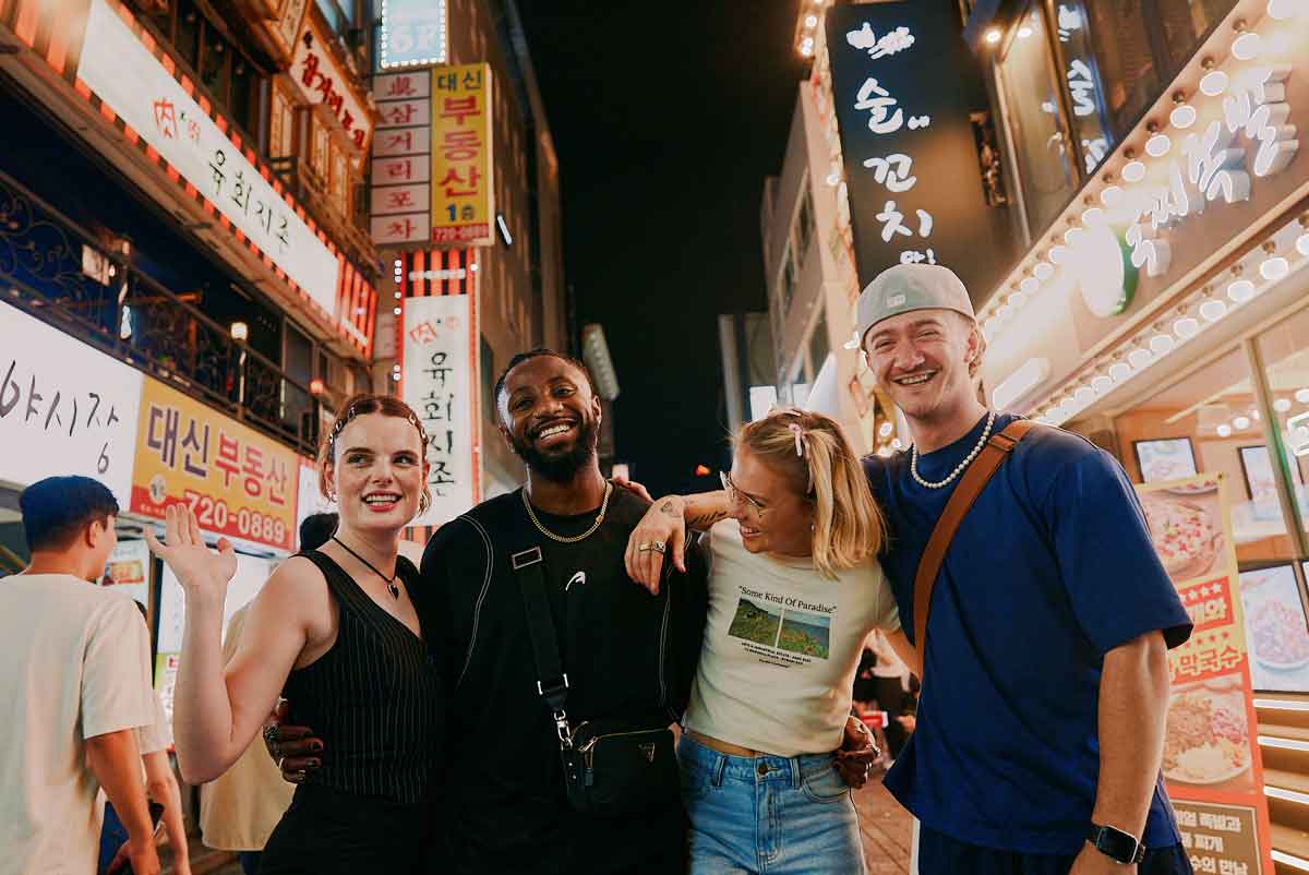 Travellers At Night In The Streets Of Seoul