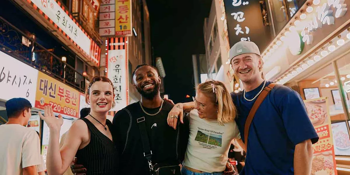 Travellers At Night In The Streets Of Seoul