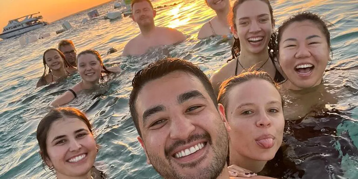 Friends Smiling While Swimming
