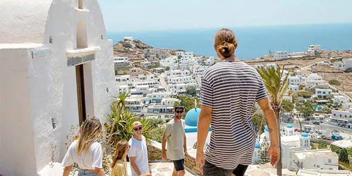 Travellers discovering a Greek island