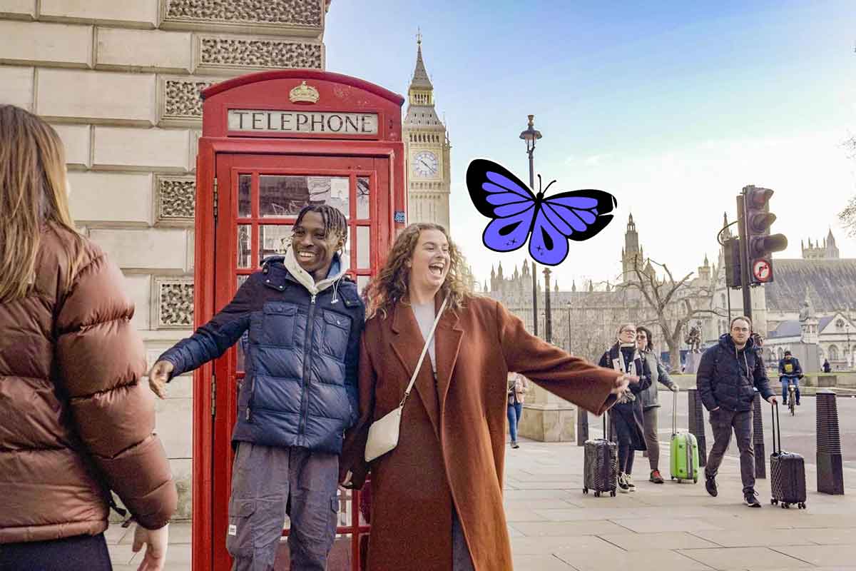 Friends Taking A Picture Close To A Phone Box Big Ben As Background