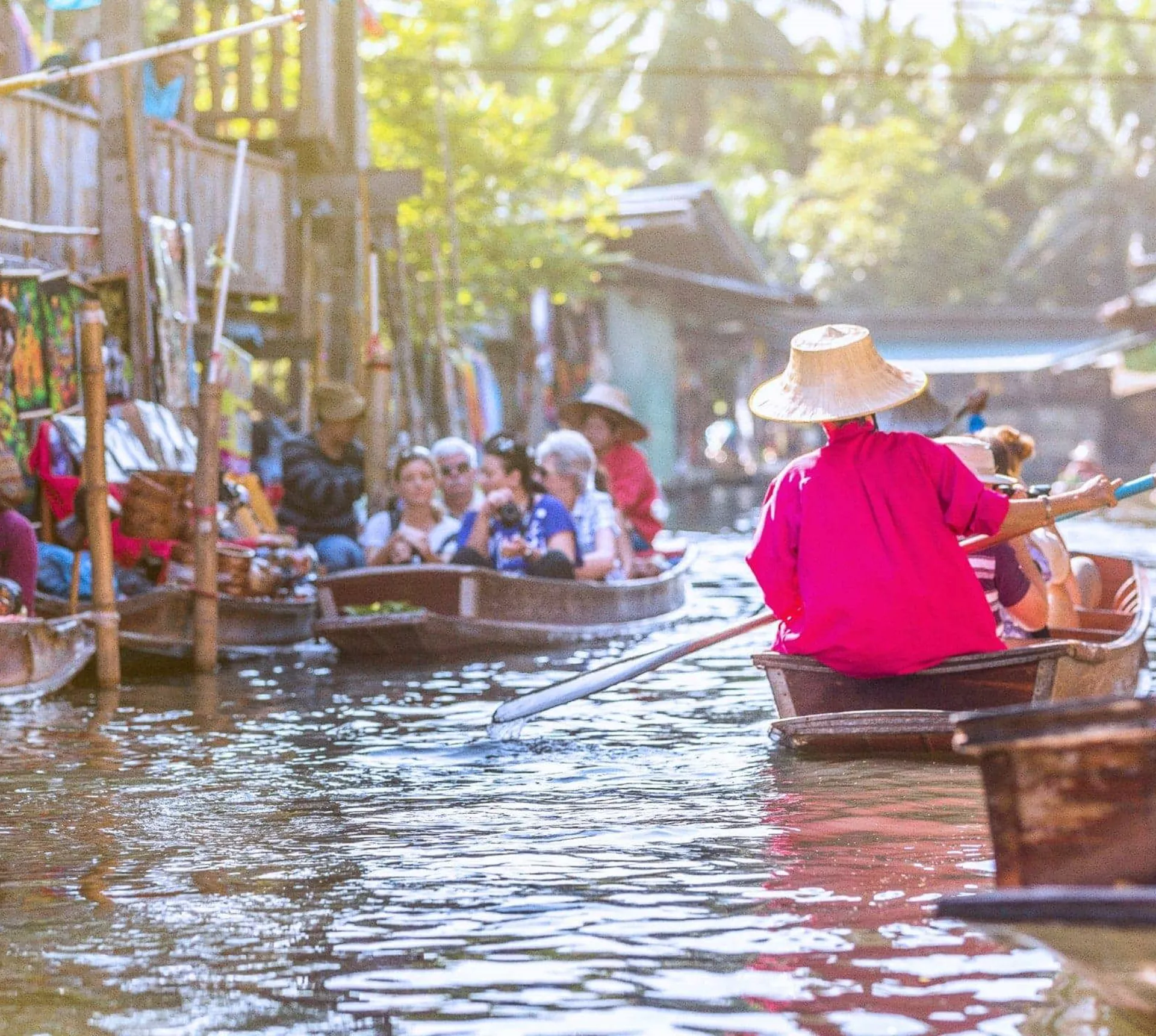Traditional floating market on Bangkok's canals in Thailand - Contiki Bangkok to Luang Prabang Tour