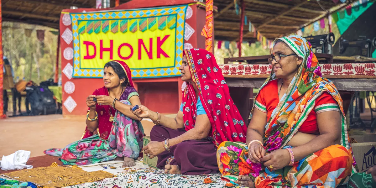 Group Of Indian Women Sat Down Talking