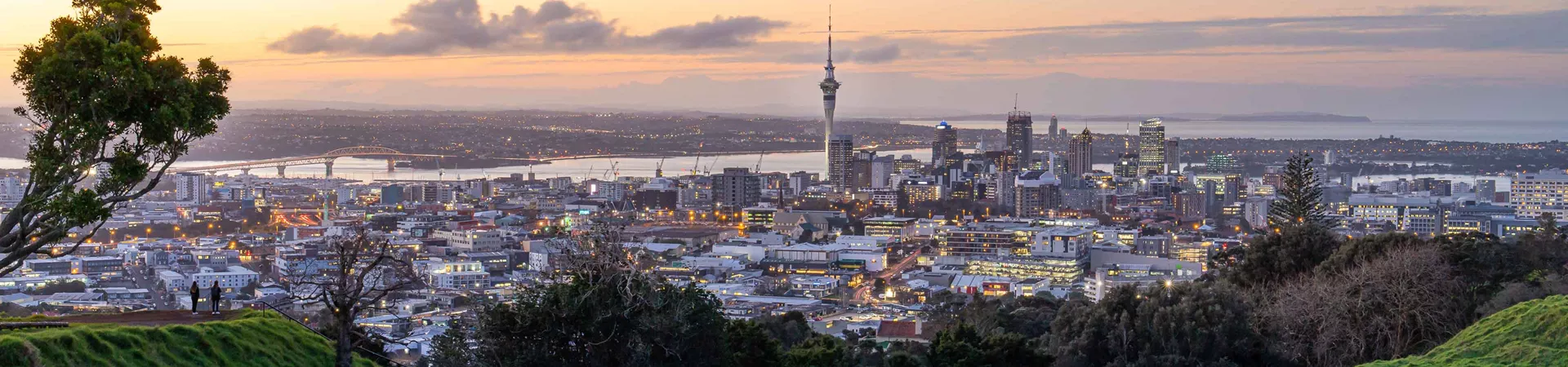 Auckland City Skyline With Auckland Sky Tower From Mt Eden At Sunset New Zealand