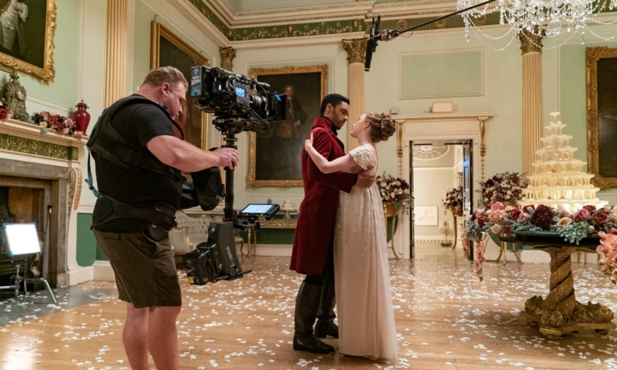 Bridgerton Scene Couple Dancing Man Recording It With Professional Camera