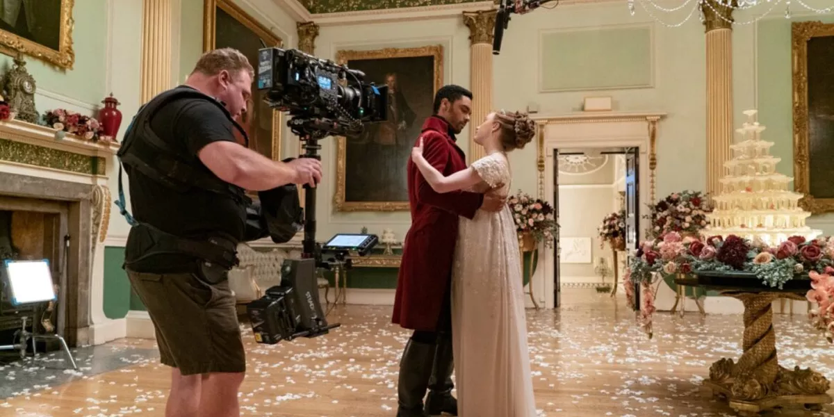 Bridgerton Scene Couple Dancing Man Recording It With Professional Camera