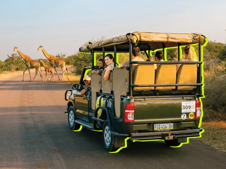 Contiki travellers doing a Safari in Africa