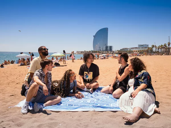 Contiki Travellers Enjoying The Sun In Barcelona Spain