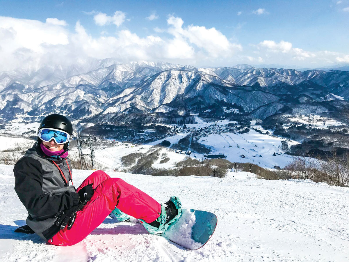 Person Smiling Snowboarding Snowy Mountains
