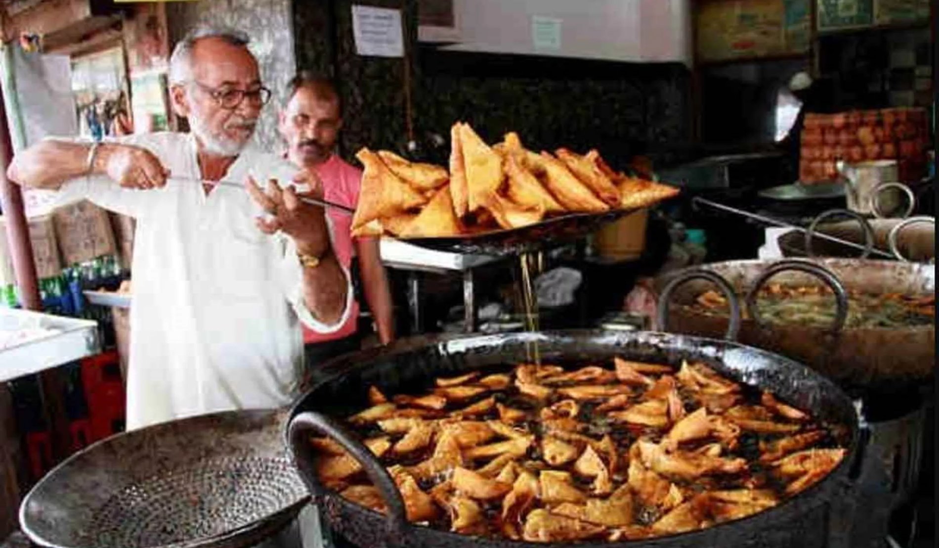 Man Cooking Samosas