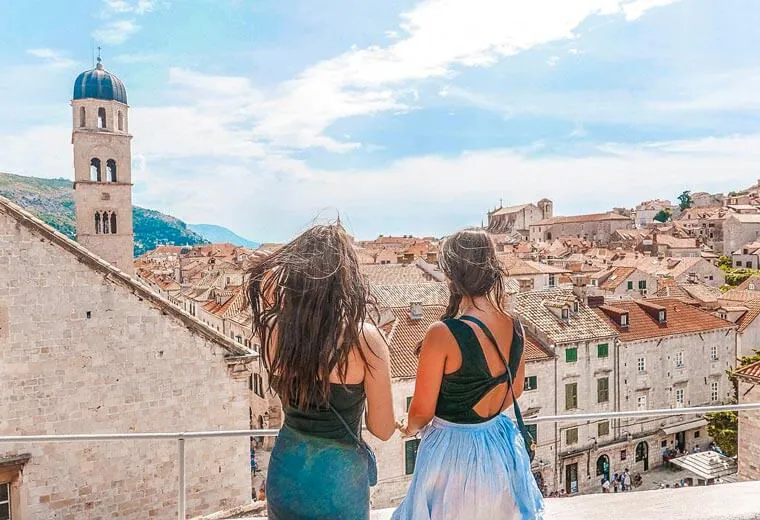 Girls admiring the roofs of the old town