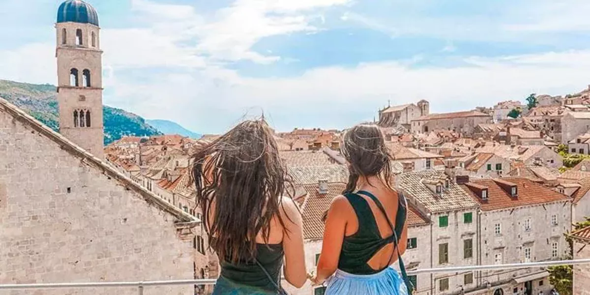 Girls admiring the roofs of the old town