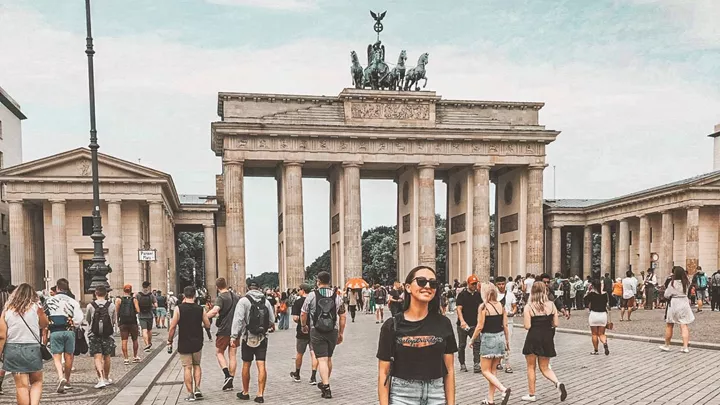 Traveller stood in front of the Brandenburg Gate in Berlin, Germany