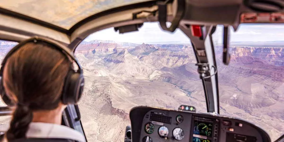 Helicopter Flyig Over The Gran Canyon