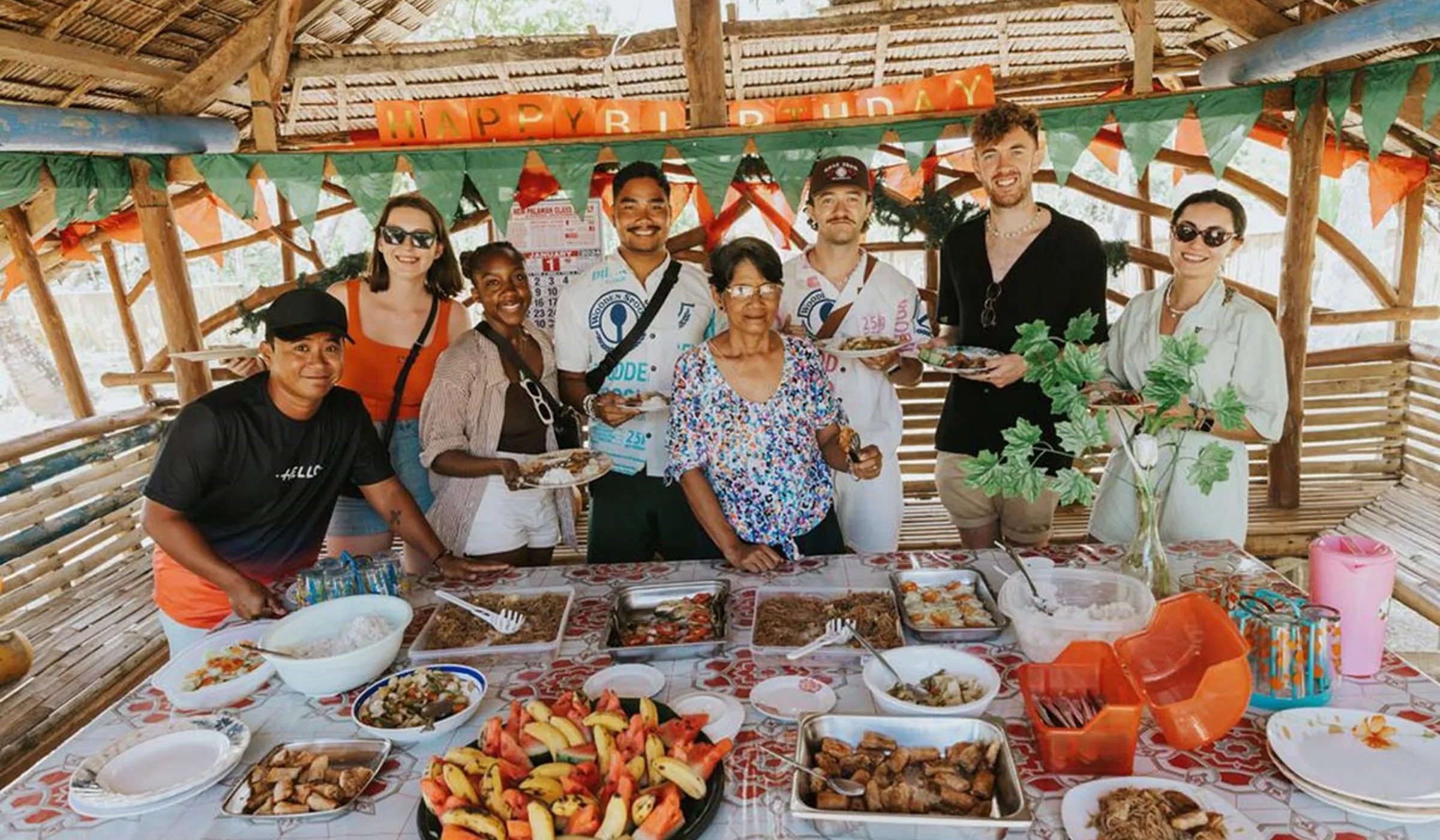 Group Of Large People Enjoying A Meal