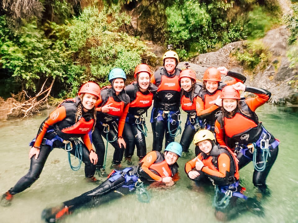 Travellers canyoning in Queenstown, New Zealand