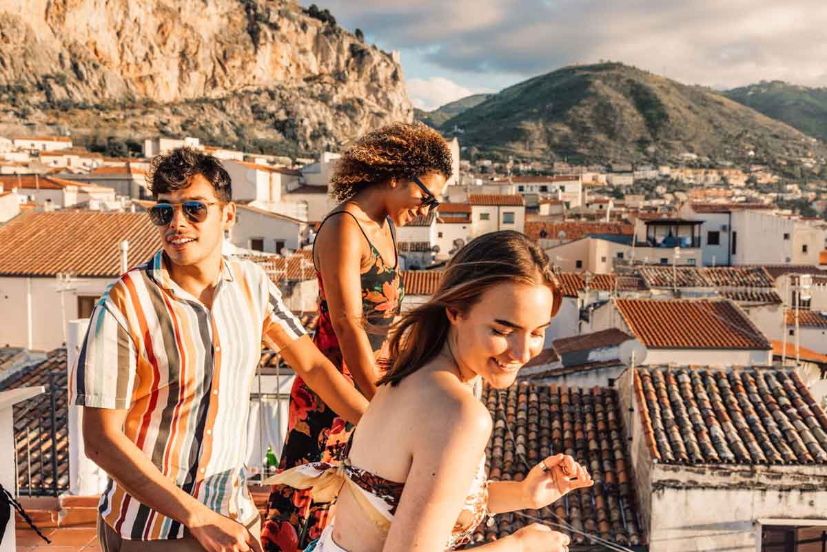 Trio Of Young Travelers On Rooftops In Sicily 33 29548