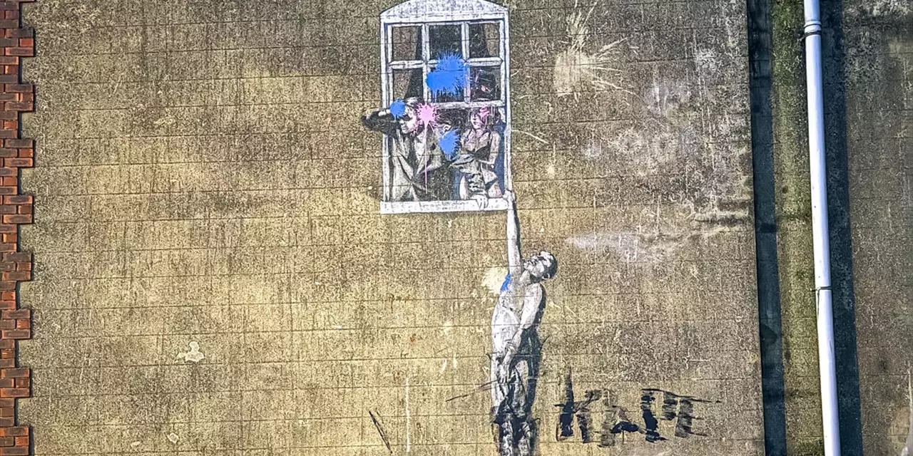 Graffiti on a building wall in England.
