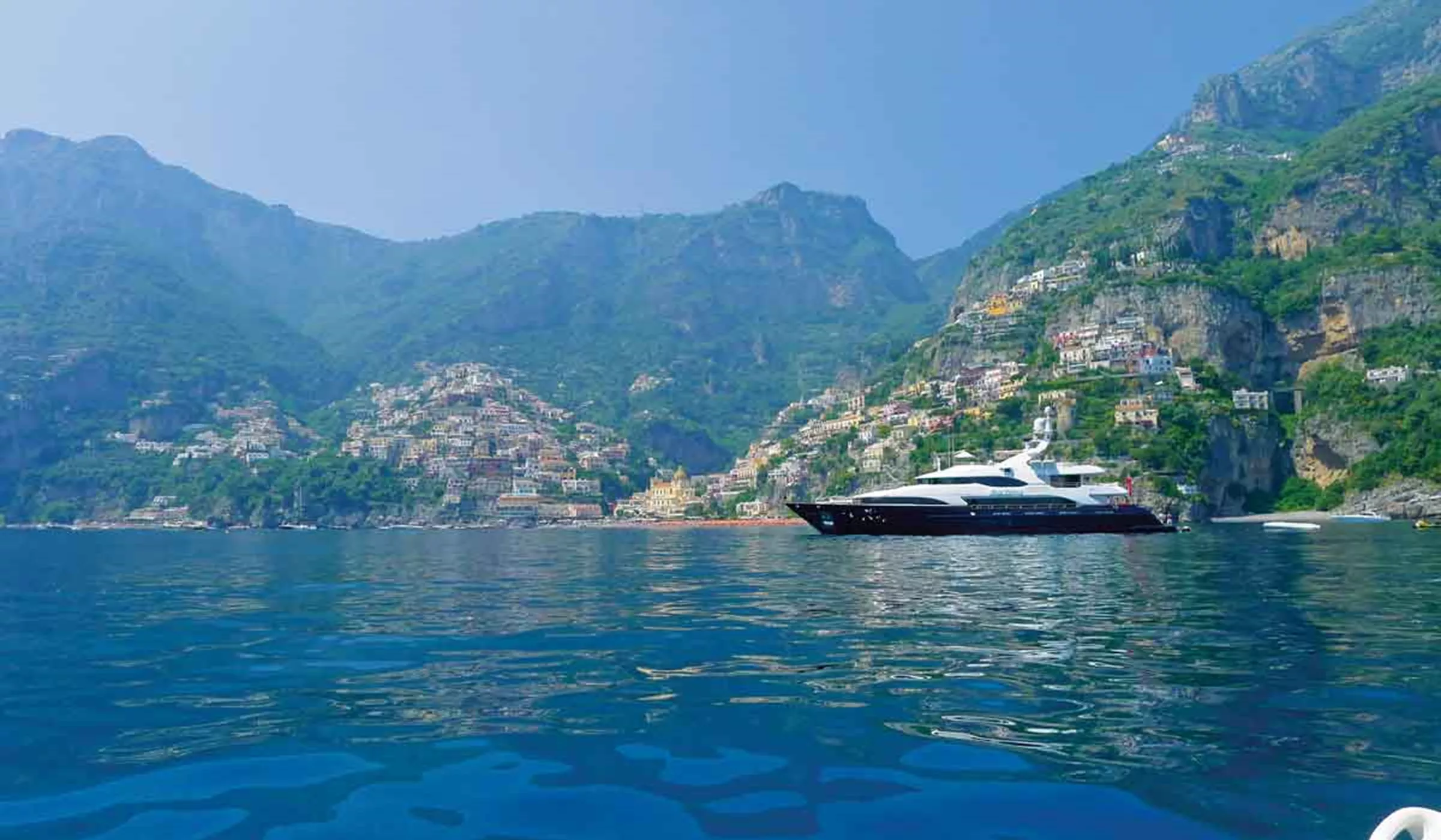 Modern yacht on Amalfi Coast, Italy