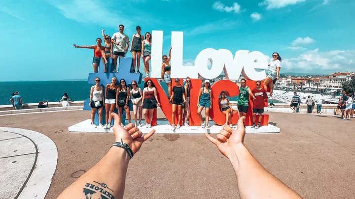 Travellers at Nice sign in the French Riviera, France