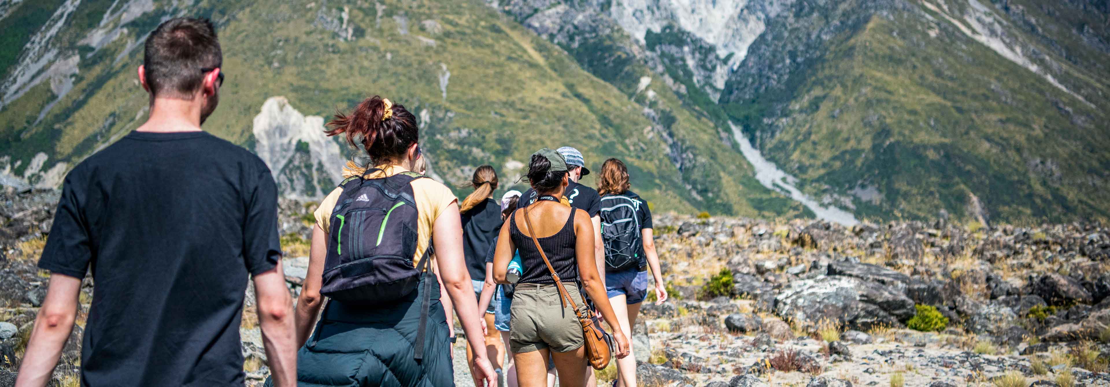 https://www.contiki.com/media/r0ph0jqc/group-of-adventurers-hiking-through-new-zealand-mountains-0231nwzd2020.jpg