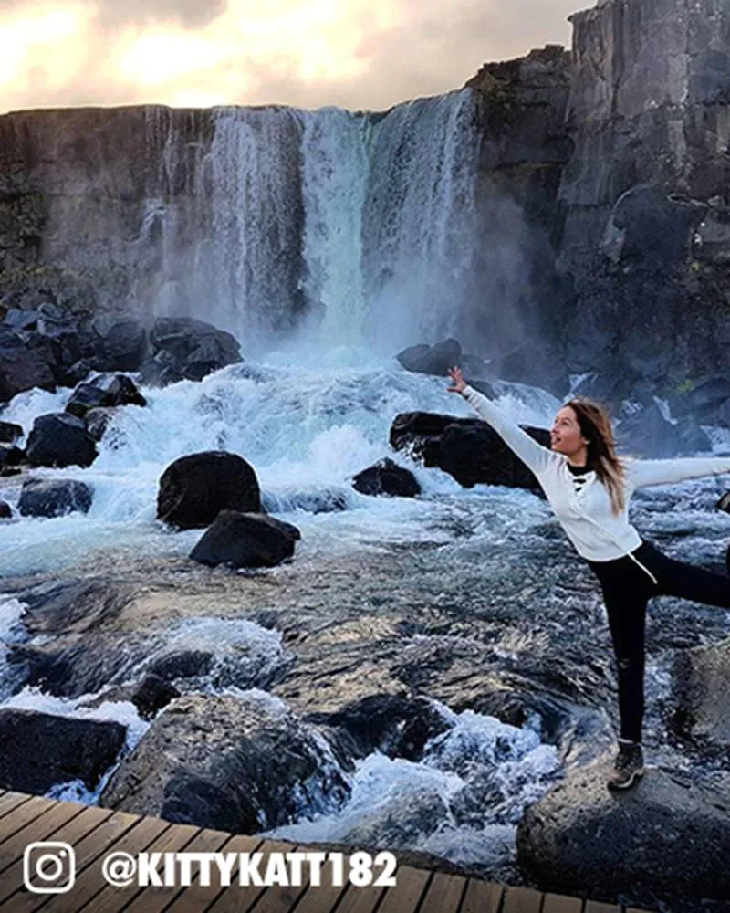 Traveller Next To Waterfall