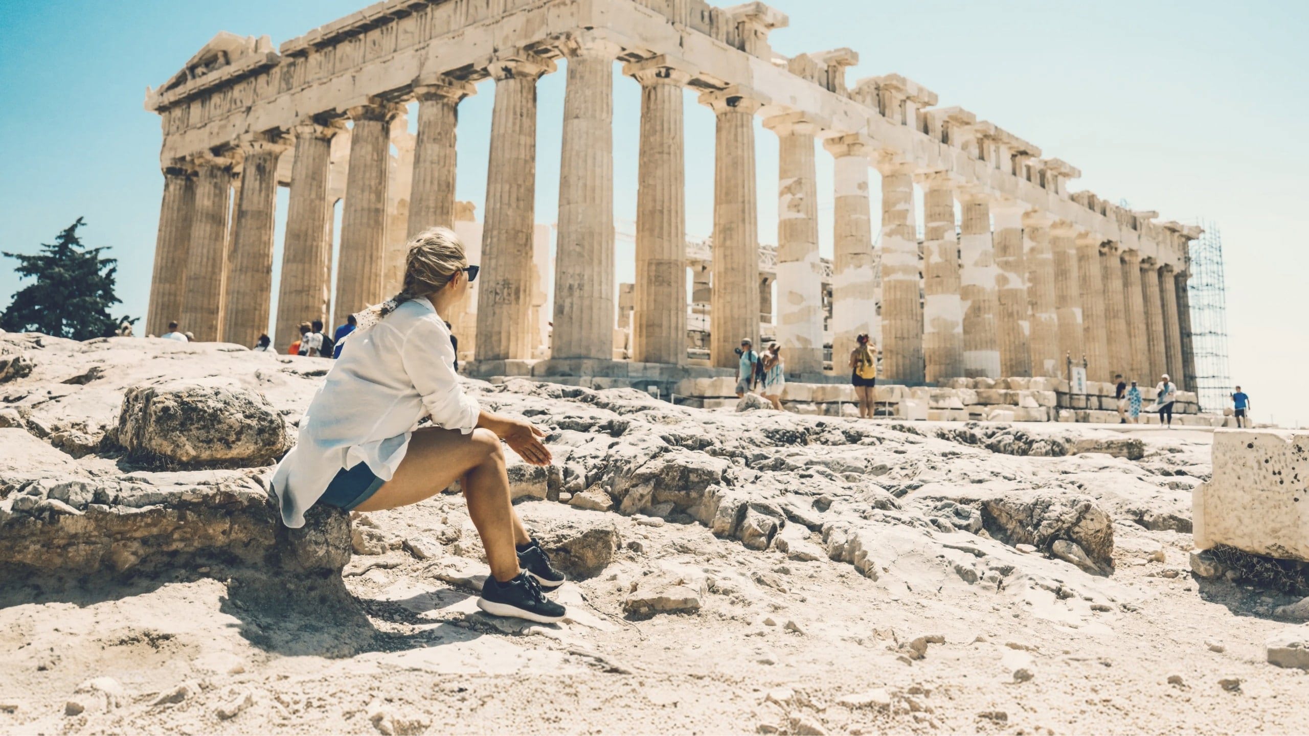 Contiki traveller admiring the Parthenon atop the Acropolis in Athens, Greece, on the Ultimate European Plus Egypt Tour