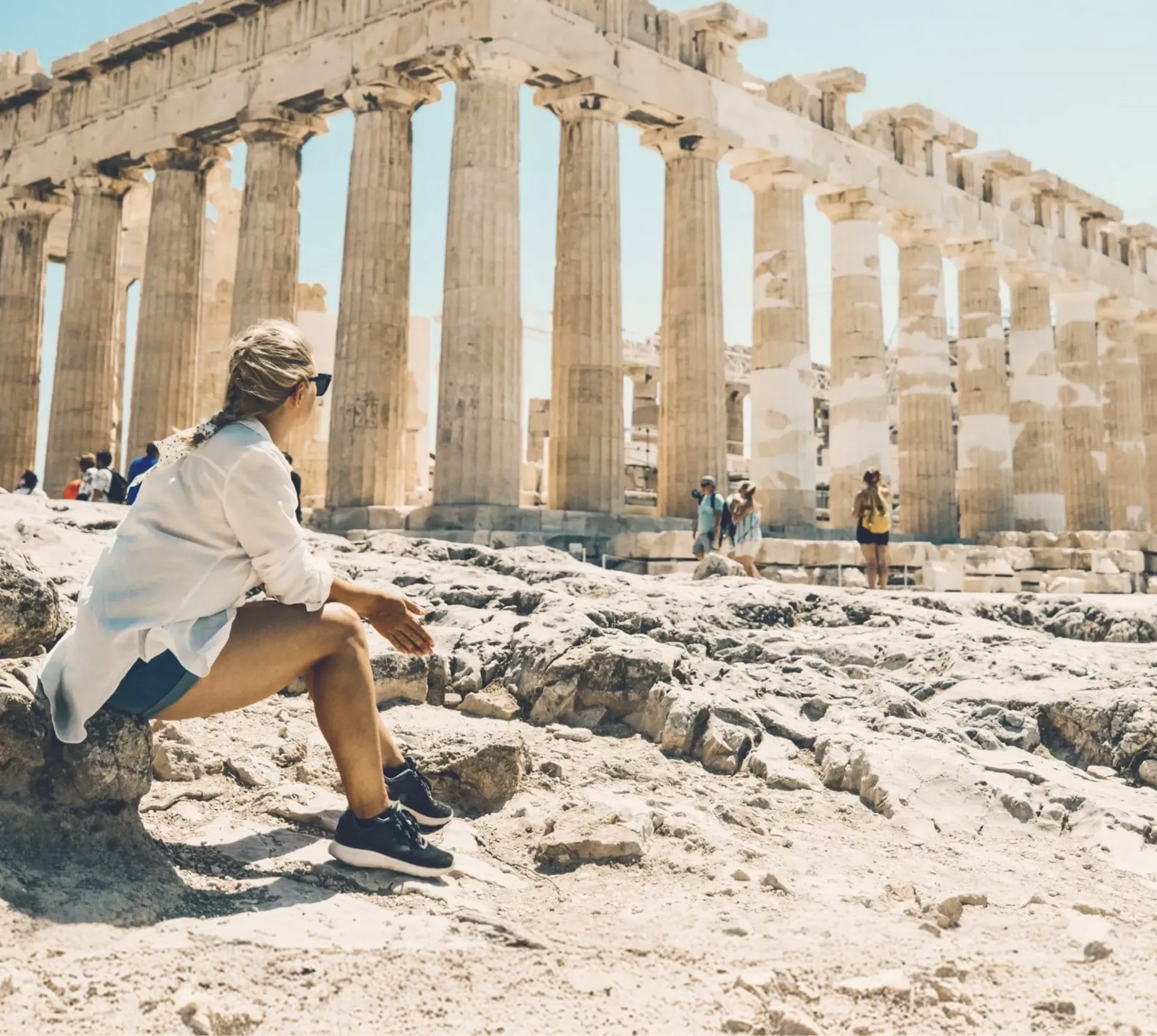 Contiki traveller admiring the Parthenon atop the Acropolis in Athens, Greece, on the Ultimate European Plus Egypt Tour
