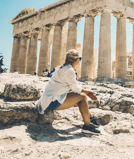 Contiki traveller admiring the Parthenon atop the Acropolis in Athens, Greece, on the Ultimate European Plus Egypt Tour