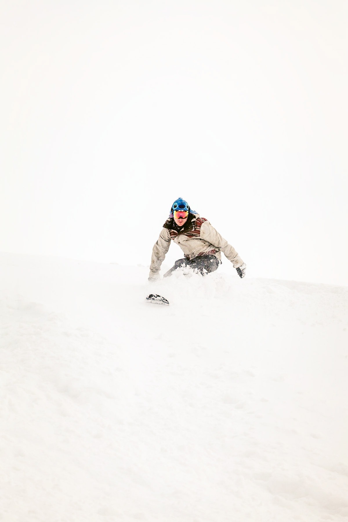 Person Snowboarding Deep Snow