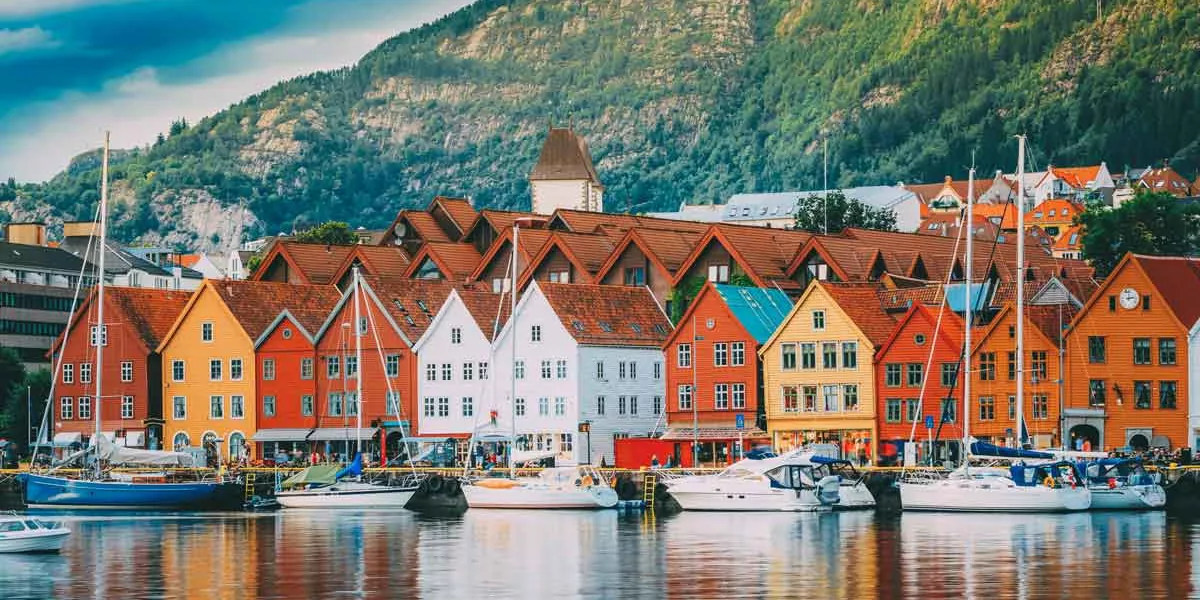 Houses By Sea Against Sky In City
