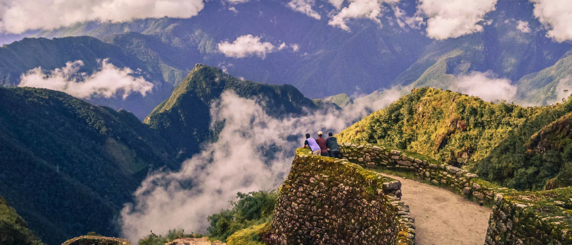 faq-banner-hikers-looking-at-the-sacred-valley-machu-picchu-peru.jpg