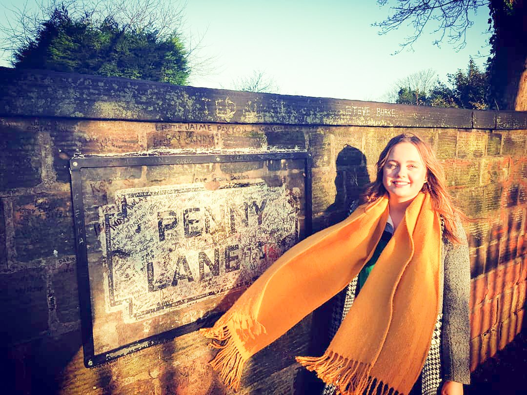 Traveller at Penny lane in Liverpool, England