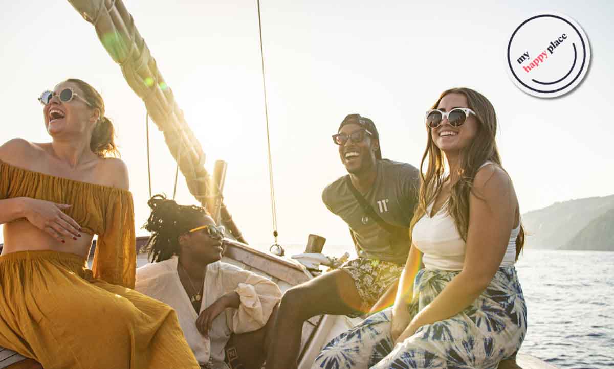 People On Boat In Sun Greece