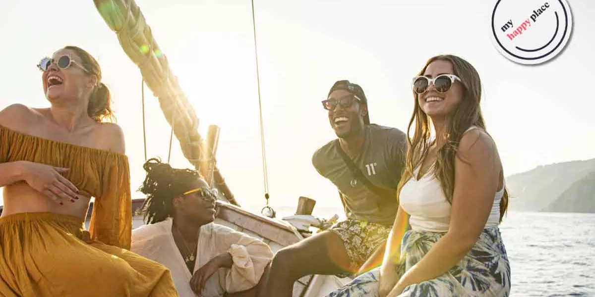 People On Boat In Sun Greece