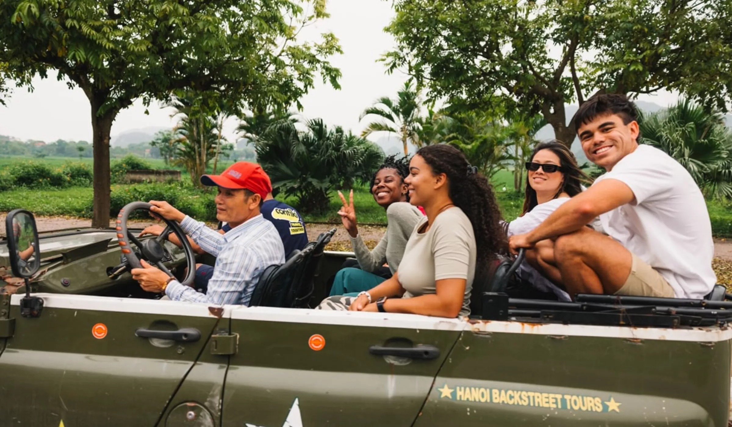 People in the car with tour guide 