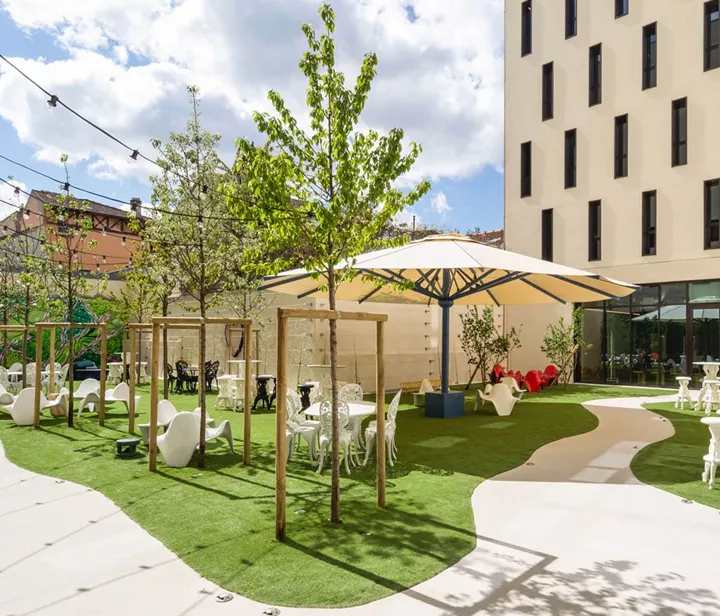 A  white umbrella in the garden