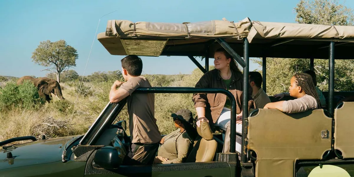 Group Of Young People In A Safari