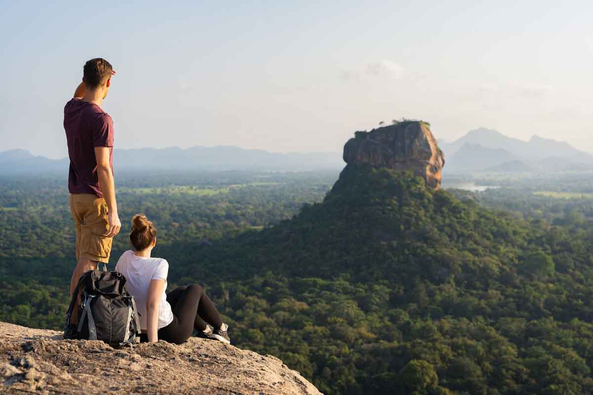 Couple Looking Over Jungle In Sri Lanka