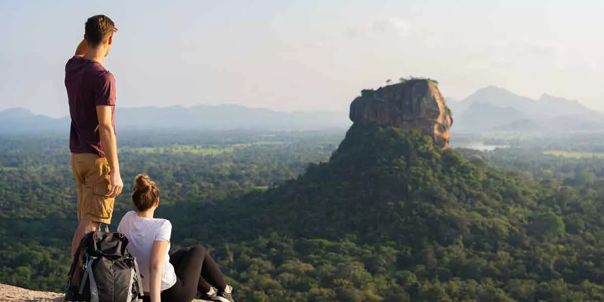 Couple Looking Over Jungle In Sri Lanka