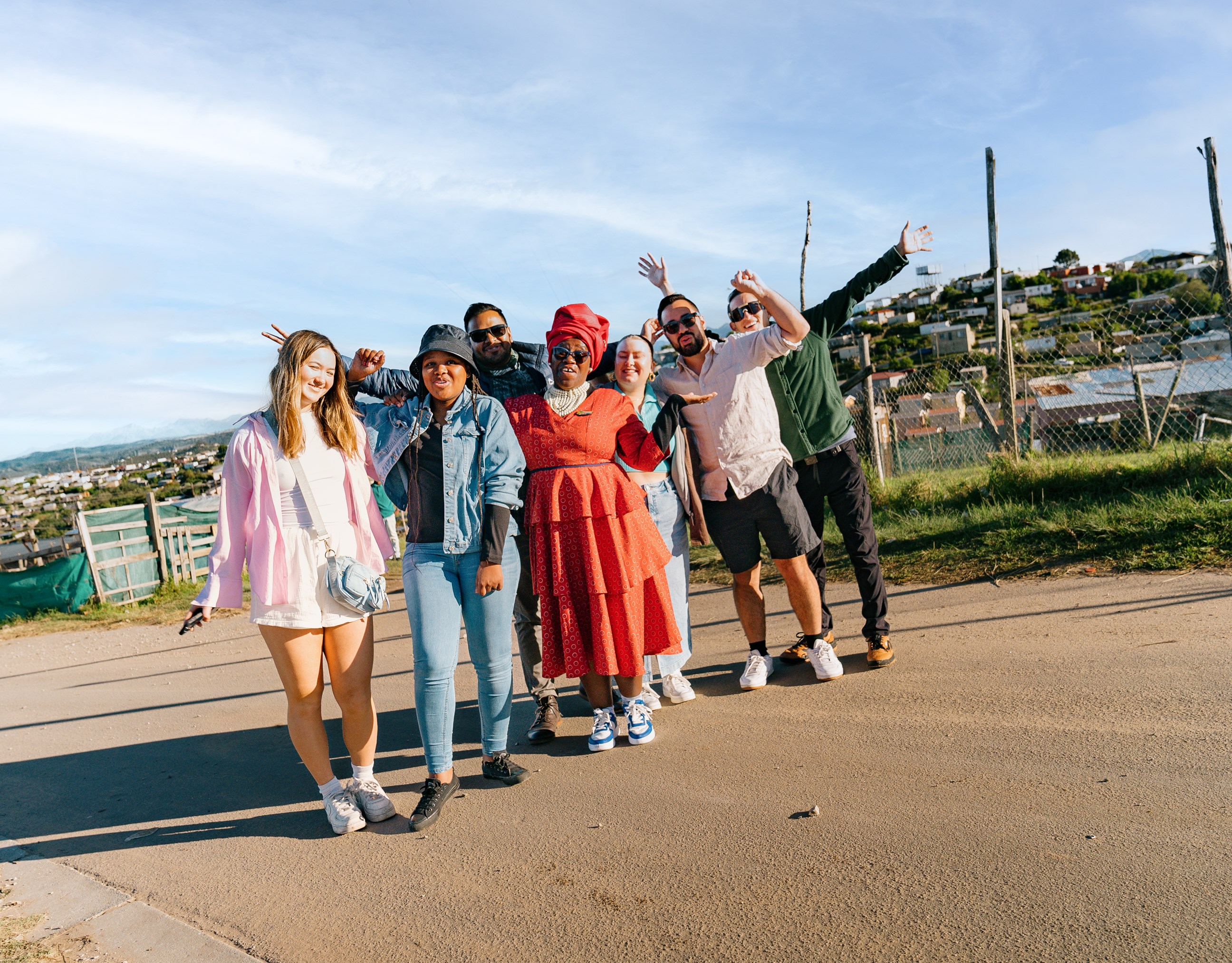Travellers Posing with Township Tour Host, Knysna, South Africa