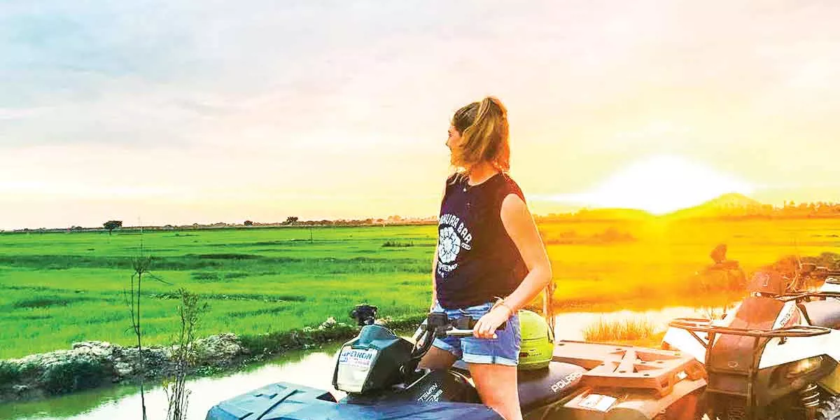 Tourist In Cambodia On Quad Bikes