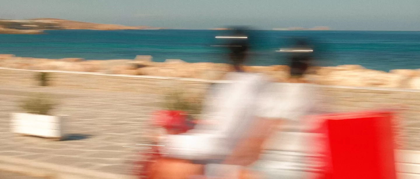 Blurred Motorbike Going Past Beach